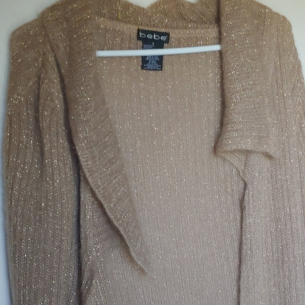 Sparkly gold Bebe over sweater